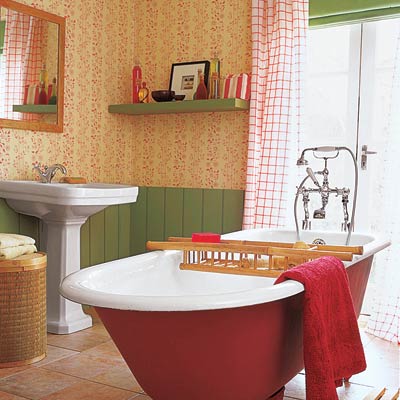 upgraded bathroom with red freestanding tub