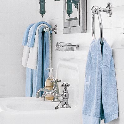 matching metal towel holders in upgraded bathroom