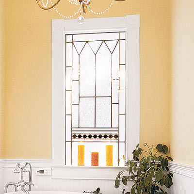 elegant bathroom with decorative stain glass window