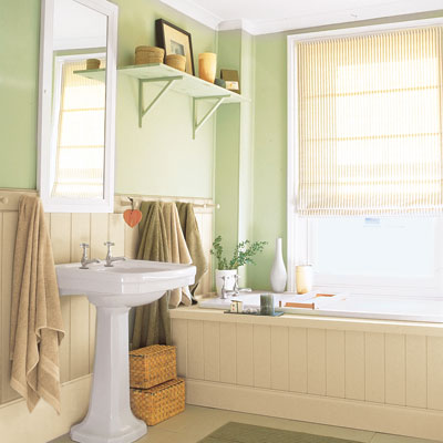 small charming bathroom with paneled tub and pedestal sink