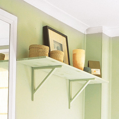 small charming bathroom with wall shelf