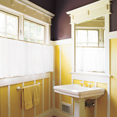 bathroom with gold and eggplant painted walls