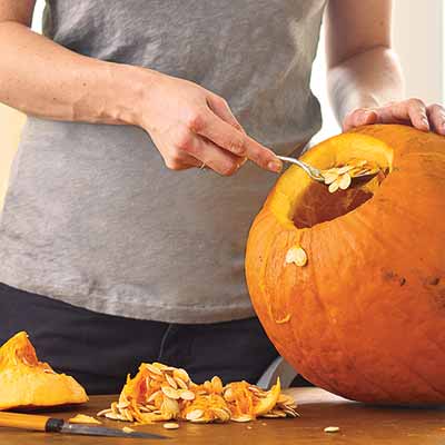 pumpkins with designs drilled into them, and lit with strings of christmas lights