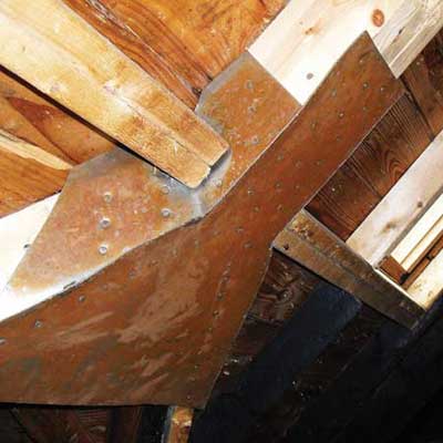 rafters in the attic reinforced with sheet metal