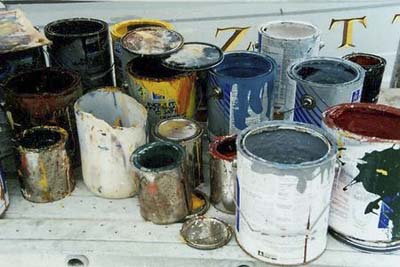 open paint cans releasing fumes