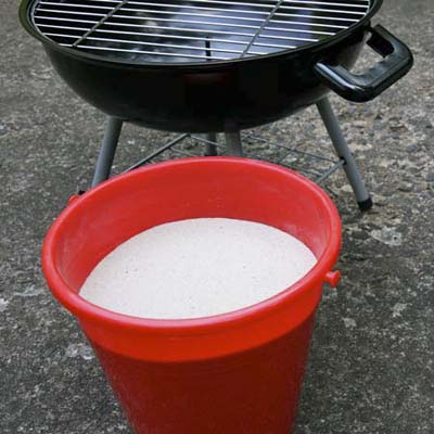 sand bucket next to grill