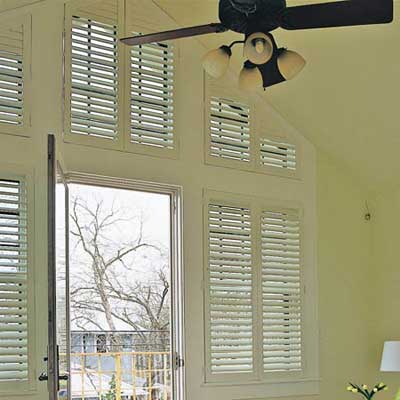 bedroom with wooden shutters
