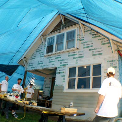 a whole-house tarp that covered the house and the job site