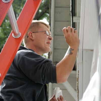 filling nail holes before applying new siding