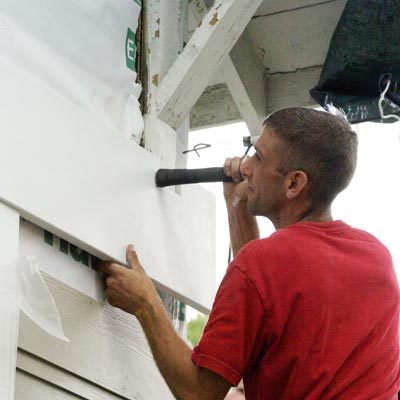 newly installed white trim board, also called spandrel board