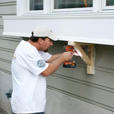 mounting brackets for a 9-foot-long flower box
