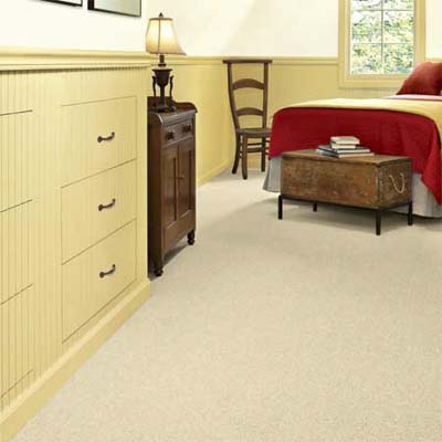 custom drawers built into a inset wall increase space in this attic remodel