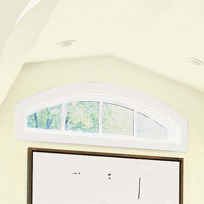 eyebrow window opens up the home office in this attic remodel