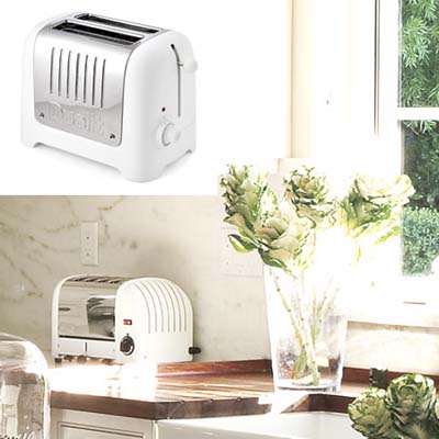 white toaster is retro-modern in rustic kitchen