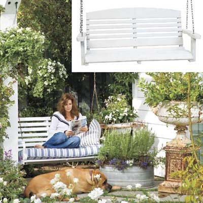 Overflowing garden with porch swing