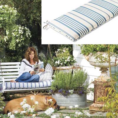 Striped cushion on porch swing
