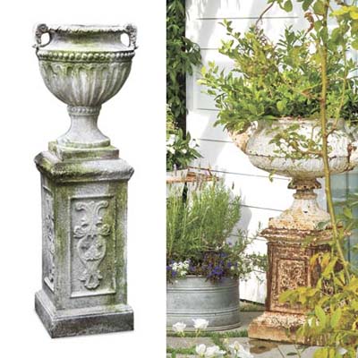 Antiqued urn hold overflowing greens in garden