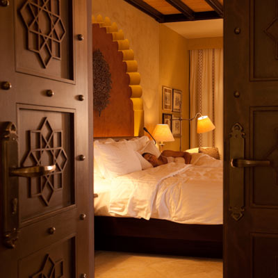woman sleeping in dim bedroom lighting