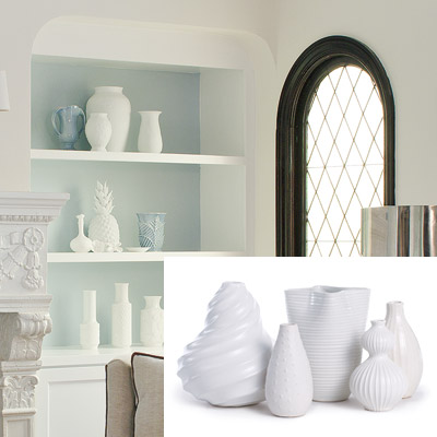 well furnished living room with a collection of white vases