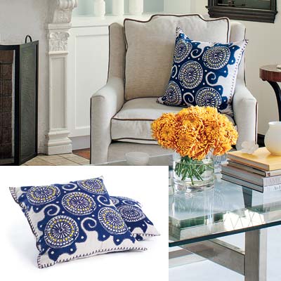 well furnished living room with graphic pillow covers