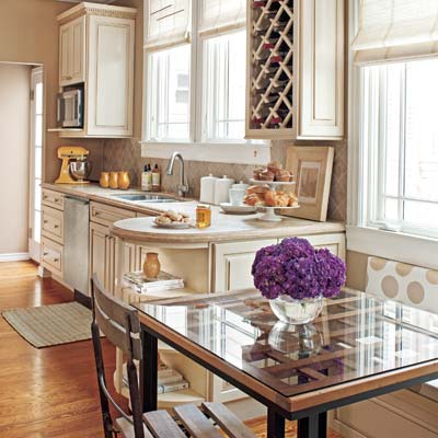 kitchen with taupe tile backsplash and yellow accents