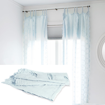 light airy bedroom with light diffuser curtains