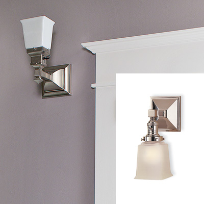 sage and lavender bathroom with sconces