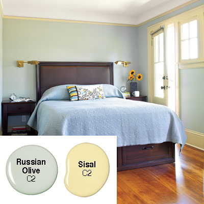 master bedroom with pale dusty blue green walls with khaki trim