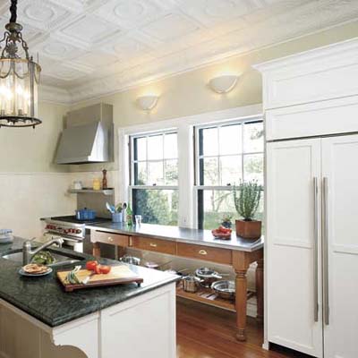 old-fashioned detail at either end of a snack bar in this remodeled kitchen