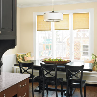 period style kitchen with white trim and beige walls