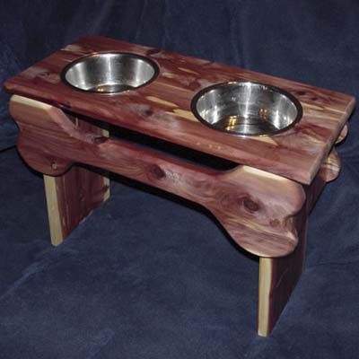 wood dog feeding station with bone accents