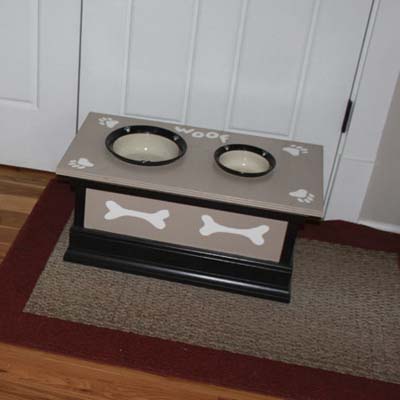 wood dog feeding station with bone accents