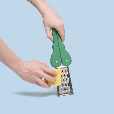 kid's cheese grater with alligator accent