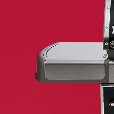 the Weber Genesis-310 three-burner propane grill close up on the prep shelf