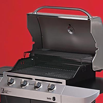 the Char-Broil Commercial Series four-burner propane grill close up on the cooking area