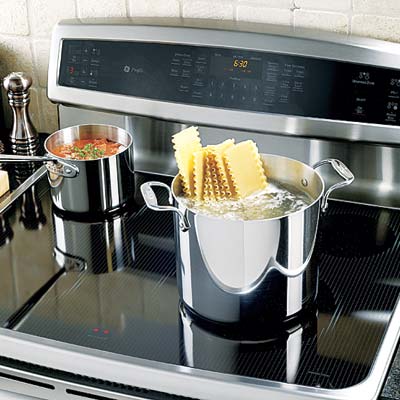 ge thirty six inch induction range with pots cooking