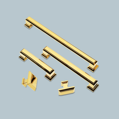 assortment of polished gold pulls and knobs from sutton place spa collection