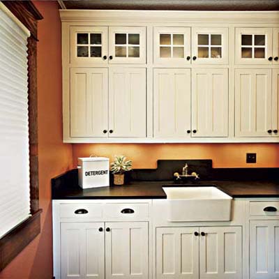 combined laundry and pantry of this victorian and craftsman style cottage after remodel
