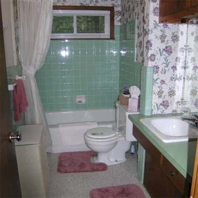 outdated bathroom with teal tile
