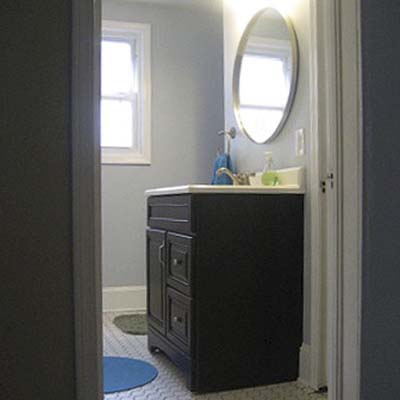 updated freestanding bathroom vanity with mirror