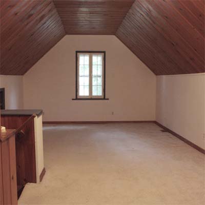 attic with sloped ceilings