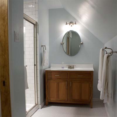 bathroom with sloped ceiling
