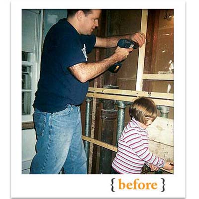 father and daughter working on the 2010 reader remodel winner house
