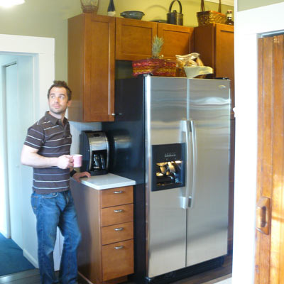 man standing in remodeled kitchen