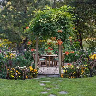 antique elements border a garden patio