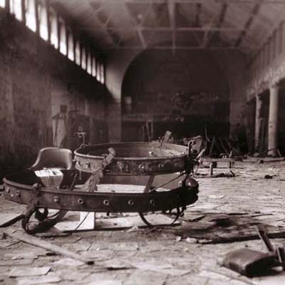 fallen chandelier in asylum cafeteria ruins