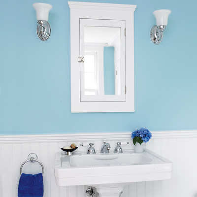 bath with white medicine cabinet and pedestal sink