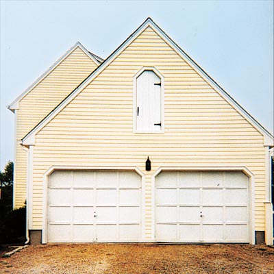 house with unattractive garage doors