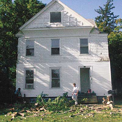unfinished stick style house