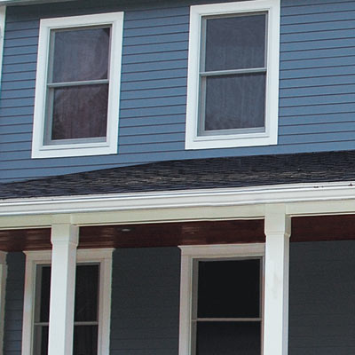 remodeled colonial revival house with curb appeal and new siding
